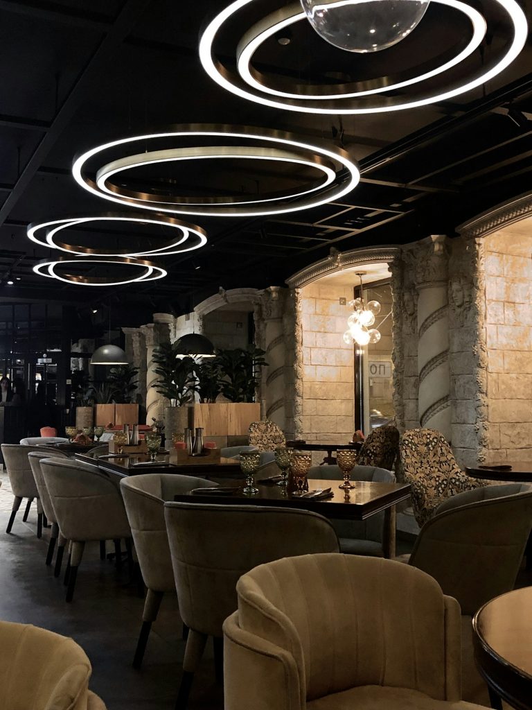 Fancy stylish elegant restaurant interior with modern lighting at night with no people